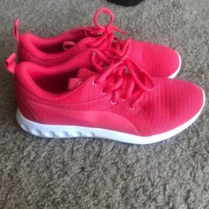Pink puma tennis shoes